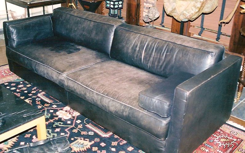 #wornLeatherSofa